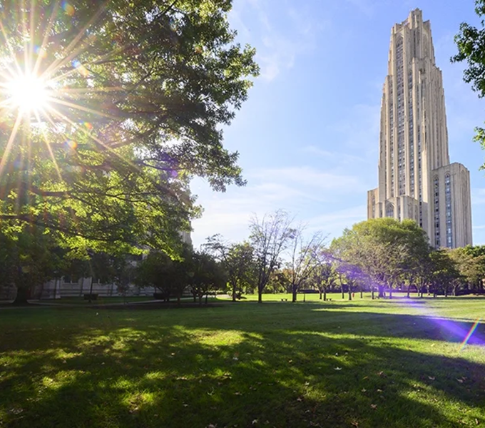 Cathedral of Learning and green lawn on campus